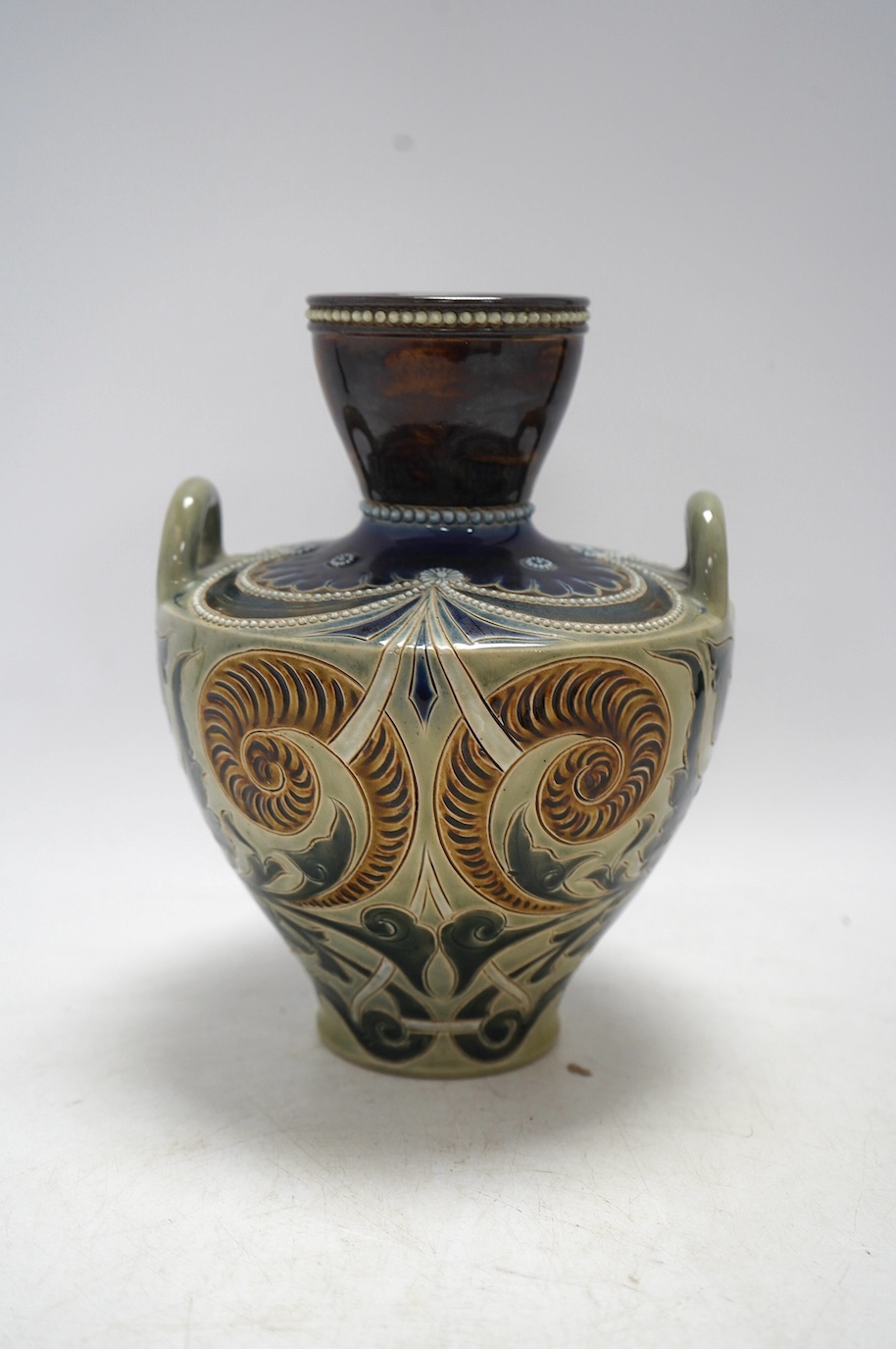 A Doulton Lambeth vase by Stormer, monogrammed and dated 1887, 20.5cm high. Condition - good